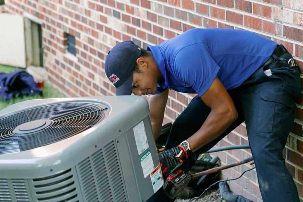 HVAC-tech-installing-new-system-1
